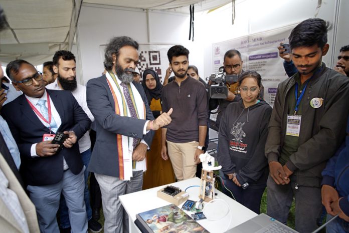 Organisers and guests inspecting a stall on the occasion of ‘Manak Mahotsav’ celebrations on Saturday.