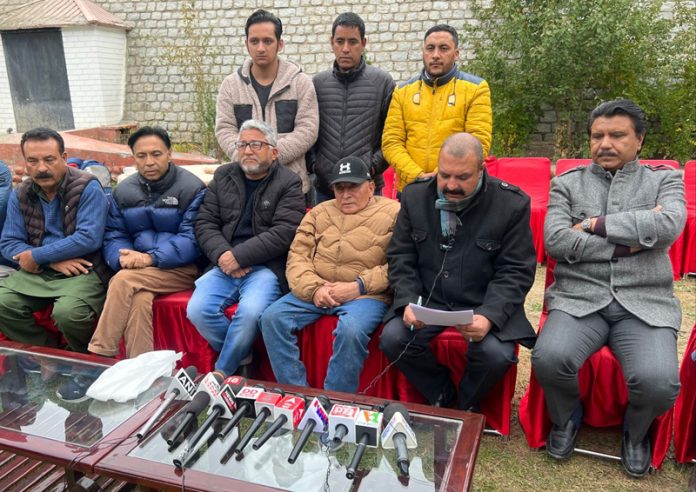 NC and Cong leaders addressing media persons in Kargil on Tuesday. —Excelsior/Basharat Ladakhi