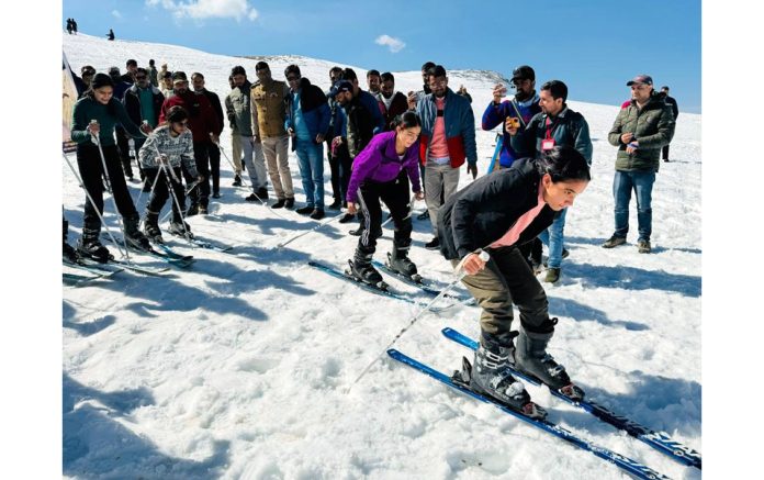 Women players taking part in snow skiing event in Sub Division Chatroo in Kishtwar on Sunday.