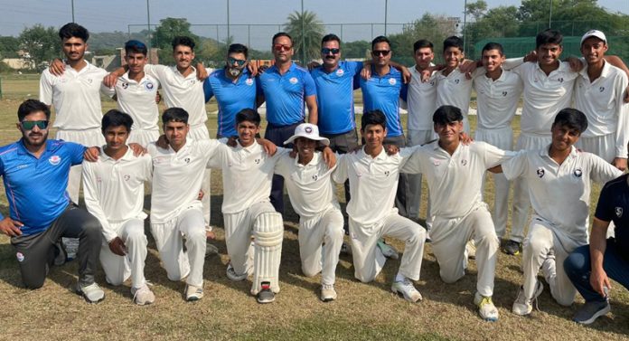 J&K Cricket team posing with team management.