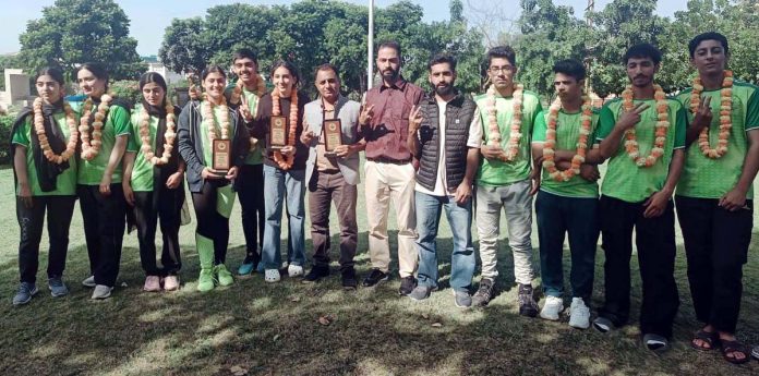 Softball Tennis players posing with dignitaries. Softball Tennis players posing with dignitaries.