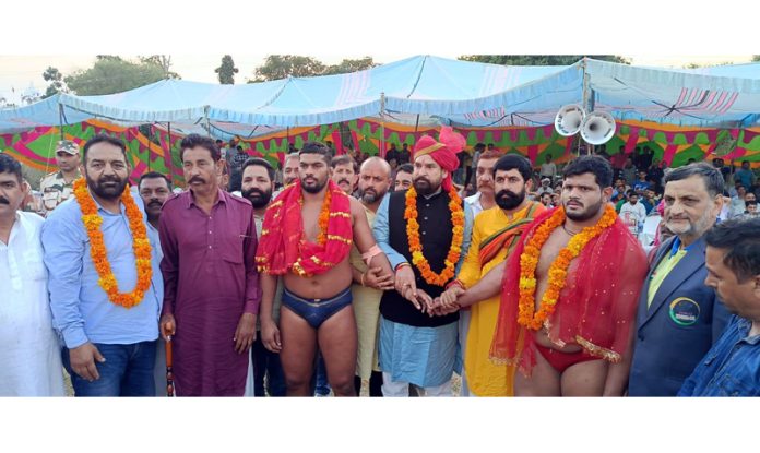 Vikram Singh Vicky, President Yuva Rajput Sabha posing with wrestler in Jammu. Vikram Singh Vicky, President Yuva Rajput Sabha posing with wrestler in Jammu.