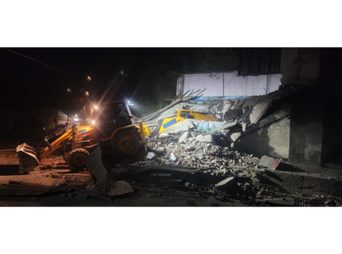 Structures on fort land being demolished by District Administration Poonch. Structures on fort land being demolished by District Administration Poonch.