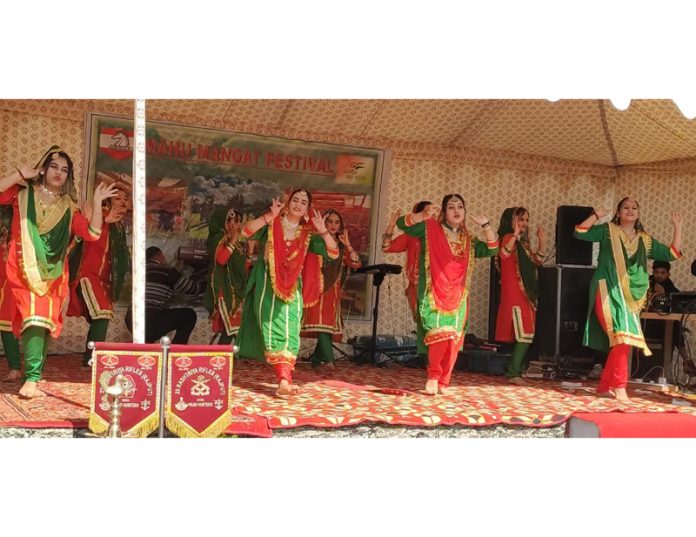 Artists performing during Cultural Fest & Village Carnival at Mahu in Ramban district on Saturday. - Excelsior/Shubam Anthal Artists performing during Cultural Fest & Village Carnival at Mahu in Ramban district on Saturday. - Excelsior/Shubam Anthal