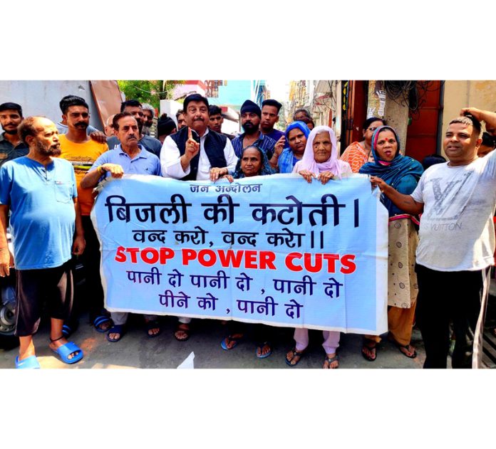 Sunil Dimple, President, MS protesting against Power Department on Thursday.