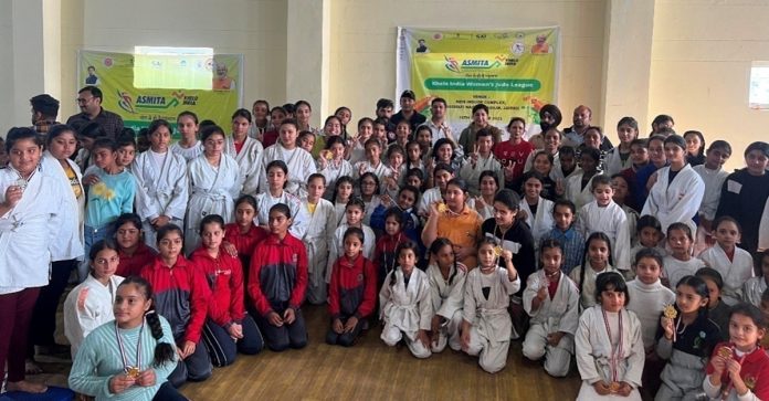 Judo players posing with medals at Jammu on Wednesday.