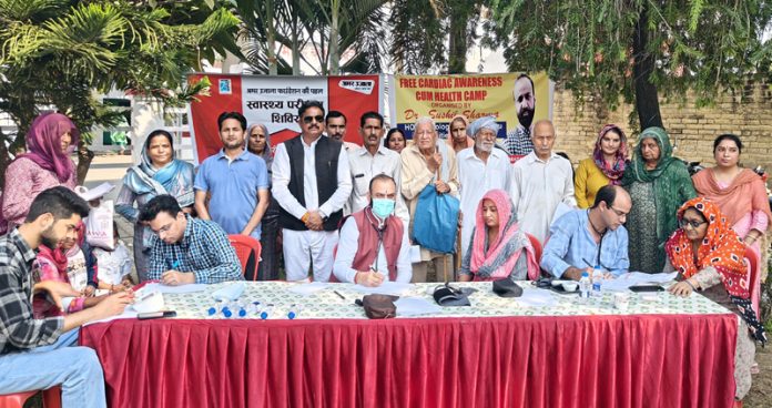 HoD Cardiology Dr Sushil Sharma examining patients at Samba on Sunday.