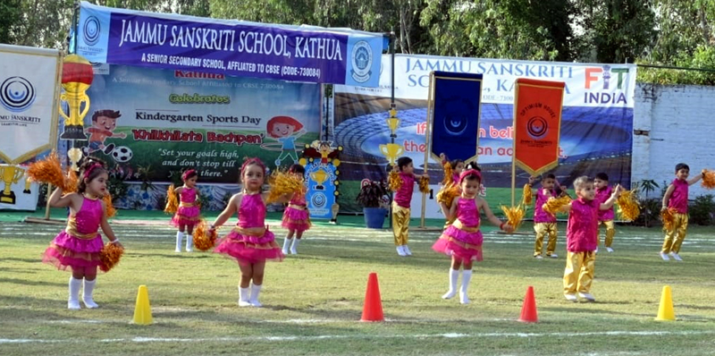 Kids performing colourful dance performances during Sports day event at Kathua. Kids performing colourful dance performances during Sports day event at Kathua.