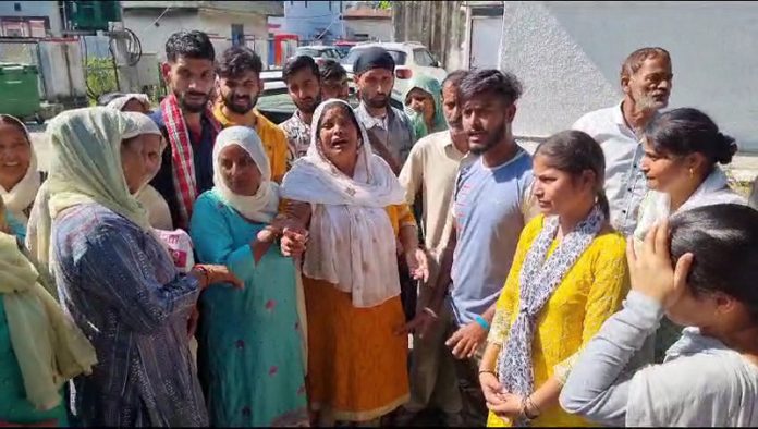 Parents and relatives of a young house wife protesting at Kathua on Wednesday. -Excelsior/Pardeep