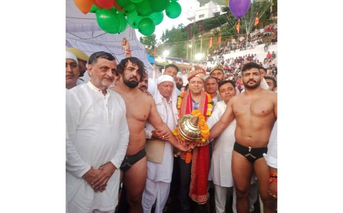 Sanjeev Verma Commissioner Secretary GAD interducing wrestlers before match at Mathwar.