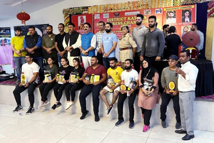 Powerlifters posing with dignitaries in Kathua on Wednesday.