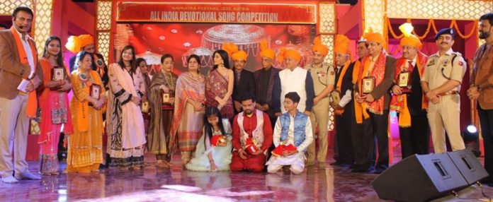Winners of the All India Devotional Song Competition and the guests in Katra on Tuesday. Winners of the All India Devotional Song Competition and the guests in Katra on Tuesday.