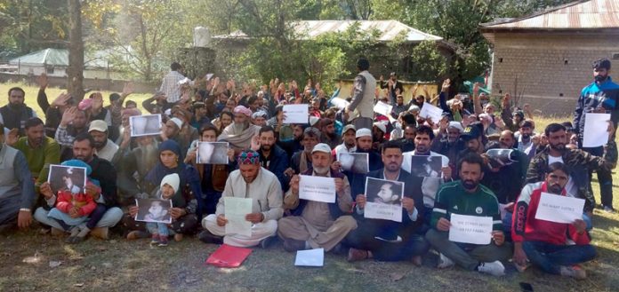 Family members and relatives of deceased staging protest dharna against custodial death of a youth at Surankote. -Excelsior/ Waseem