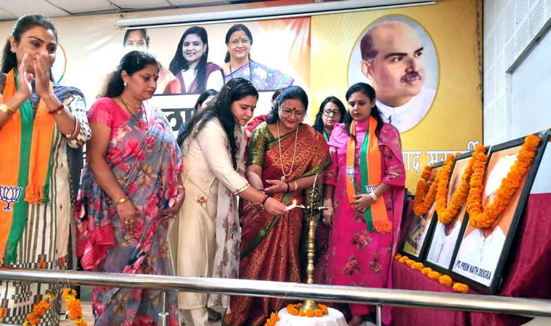 BJP Mahila Morcha, national media secretary, Neetu Dabas and other Mahila Morcha leaders lighting the lamp at a party workshop at Jammu on Sunday. BJP Mahila Morcha, national media secretary, Neetu Dabas and other Mahila Morcha leaders lighting the lamp at a party workshop at Jammu on Sunday.
