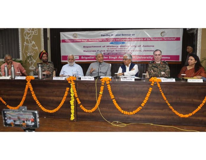 Dr Karan Singh along with JU Vice-Chancellor and others during national seminar on General Zorawar Singh at JU. -Excelsior/Rakesh