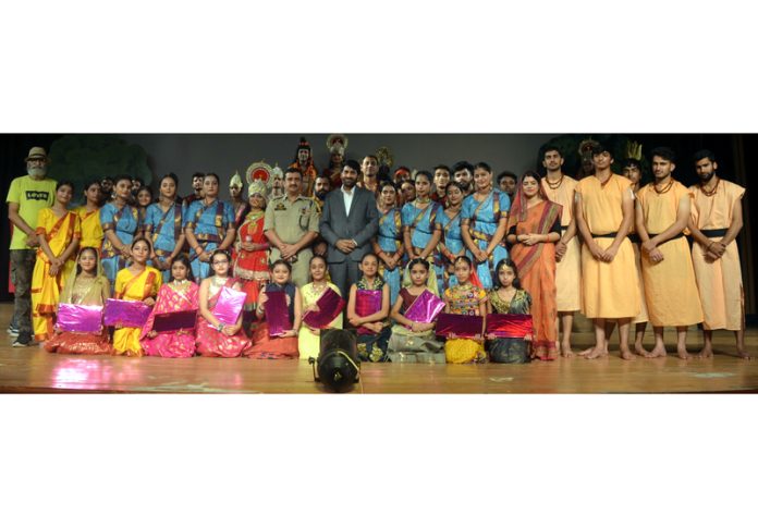 Natrang Director Balwant Thakur and ASP Katra Vipan Chandran posing with young artists during Navratra Festival at Katra.