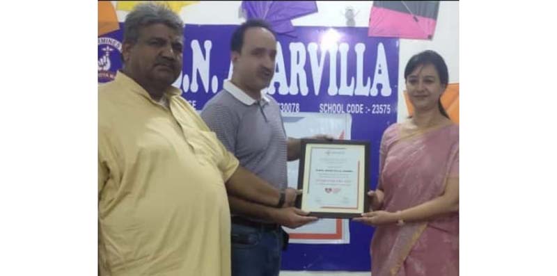 Principal DBN Amarvilla School greeting Dr Gulam Nabi with a souvenir in Jammu on Monday. Principal DBN Amarvilla School greeting Dr Gulam Nabi with a souvenir in Jammu on Monday.