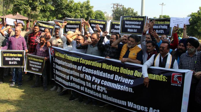 JKRTC employees staging protest demonstration in Jammu on Tuesday. — Excelsior/Rakesh
