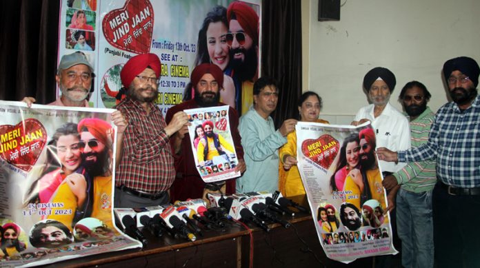 Production Head Shamsher Singh Chohalvi along with artists releasing poster of the J&K's Punjabi film 'Meri Jind Jaan' at Jammu. -Excelsior/Rakesh Production Head Shamsher Singh Chohalvi along with artists releasing poster of the J&K's Punjabi film 'Meri Jind Jaan' at Jammu. -Excelsior/Rakesh