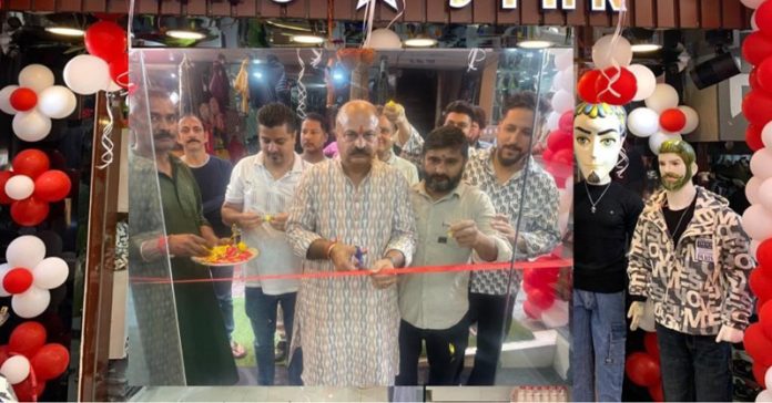 J&K BJP vice-president Yudhvir Sethi inaugurating a garment showroom at Pahari Mohalla in Jammu city.