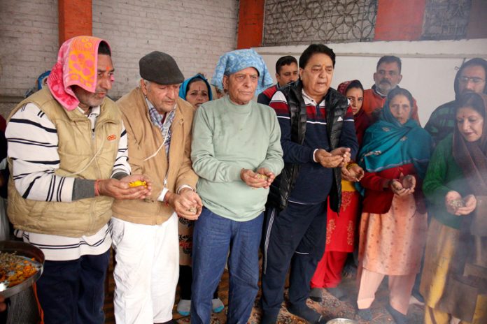 Devotees performing Maha Yagya at holy Durga Nag Shrine Srinagar on the occasion of Durga Ashtami on Sunday. — Excelsior/ Shakeel