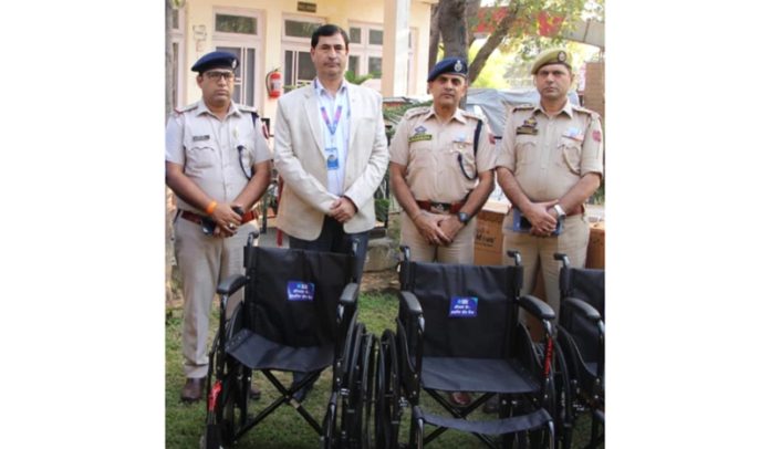 SBI Regional Manager handing over wheel chairs to GRP & RPF Jammu.