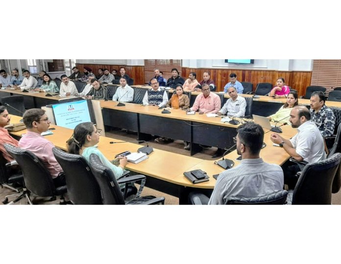 DC Income Tax Dr Mohnish Digra alongwith ITO Rajneesh Gupta during an interactive session with DDOs and AAOs at Jammu on Friday.