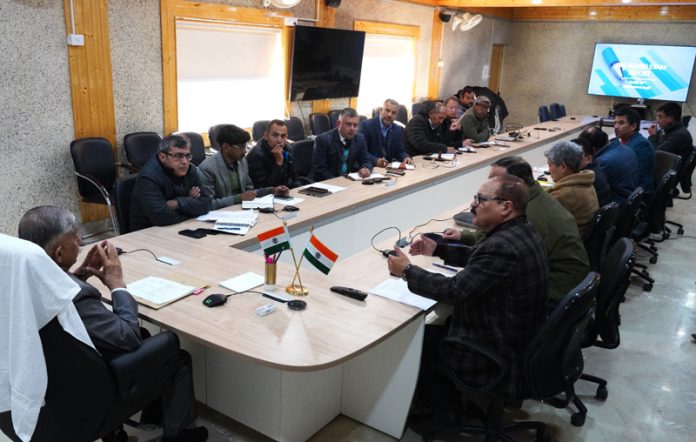 page8-1 LG Ladakh, Brigadier (Retd.) B D Mishra chairing a meeting on Monday.