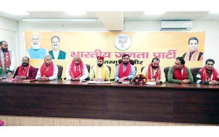 MP and national general secretary, BJP SC Morcha, Dr Bhola Singh along with other party leaders at a meeting at Jammu on Friday.