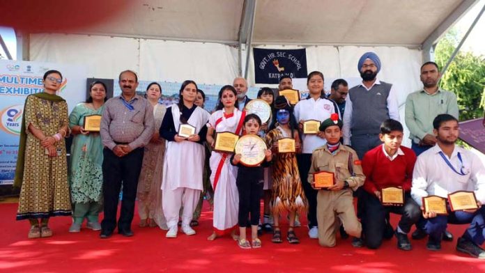 Winning candidates of events organised in the ongoing 8-day long multimedia exhibition in Katra posing for a group photograph on Wednesday.