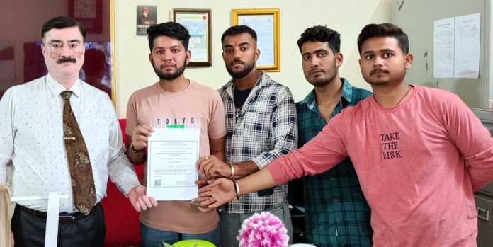 GDC Marh Principal Dr Rakesh Kumar Koul alongwith newly elected members of the Alumni Association.