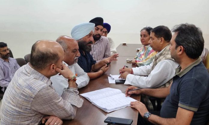 Former Minister, Sat Sharma listening public grievances at BJP office, Jammu on Wednesday. Former Minister, Sat Sharma listening public grievances at BJP office, Jammu on Wednesday.