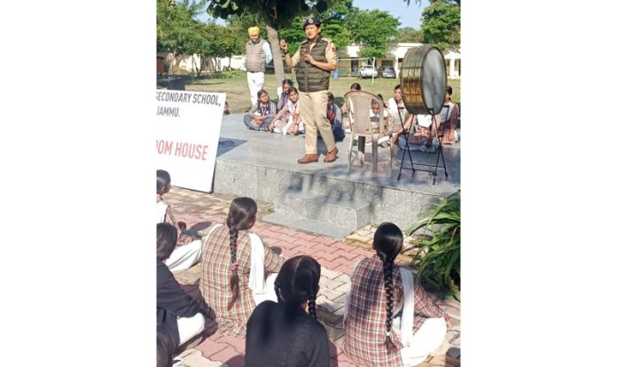SP South Shaheen Wahid addressing the students at Satwari on Friday.