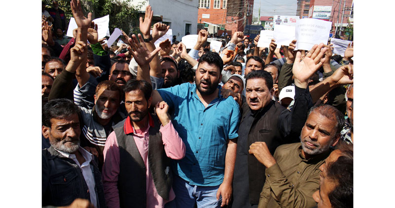PHE workers during a massive protest in Srinagar on Tuesday. -Excelsior/Shakeel PHE workers during a massive protest in Srinagar on Tuesday. -Excelsior/Shakeel