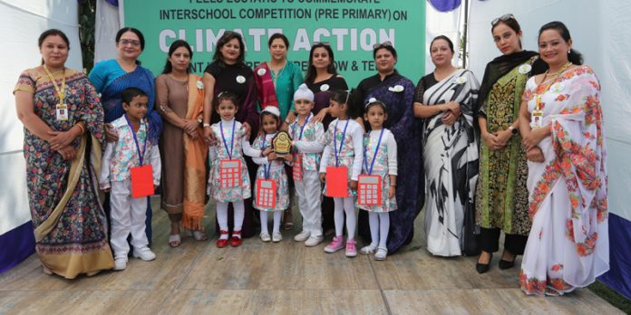 Winners of inter-school competition posing with dignitaries. Winners of inter-school competition posing with dignitaries.