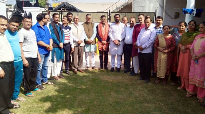 BJP leaders during a meeting at Talab Tillo on Sunday.