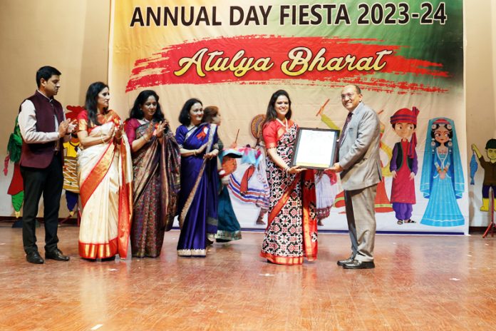 Director, MMI Pre School Jammu, Bhavna Rohmetra presenting a special memento to chief guest Anand Jain (IGP Jammu). -Excelsior/Rakesh