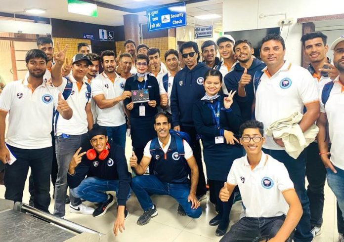 J&K team posing for a group photograph.