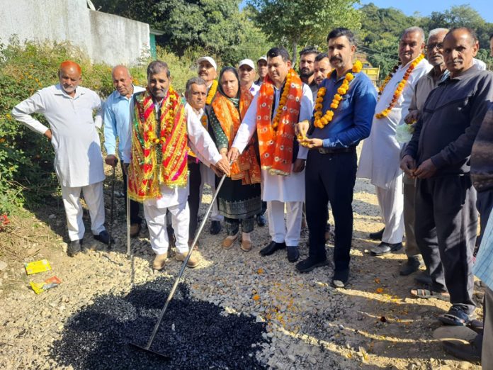 DDC Member Suresh Sharma inaugurating black topping work of Barui-Gargal road in Akhnoor on Monday.