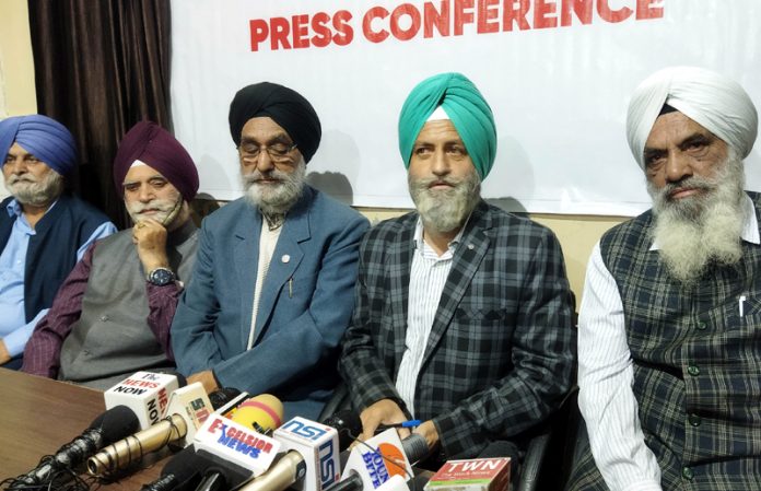 Organising Committee Kashmir Sikh Sangat (Regd) Jammu addressing press conference. Organising Committee Kashmir Sikh Sangat (Regd) Jammu addressing press conference.