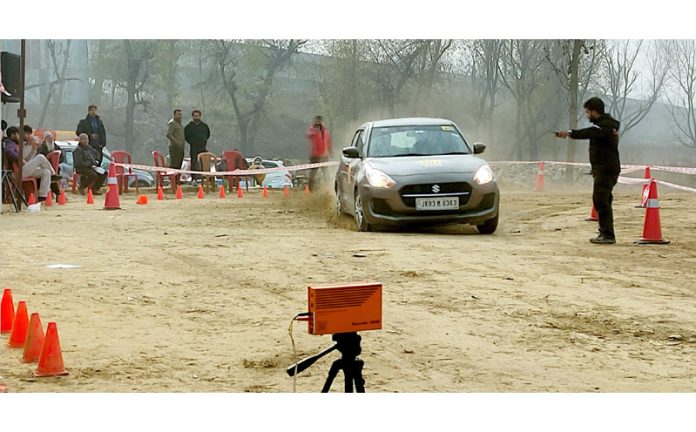 Car on a track during Autocross event held in Srinagar on Saturday. -Excelsior/Shakeel