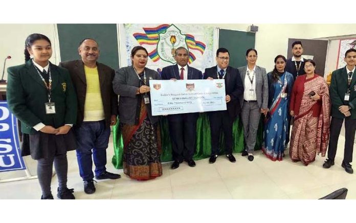 Pro Vice Chairman and Principal DPS Udhampur posing with quiz team.