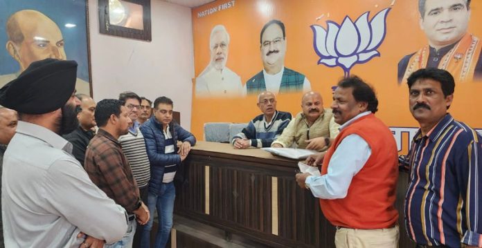 BJP vice president, Yudhvir Sethi listening public grievances at BJP Office Kacchi Chawni on Thursday.