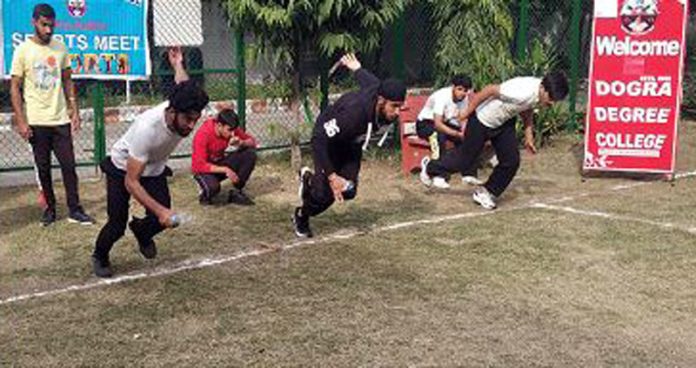 Athletes participating in race during Annual Sports Meet.