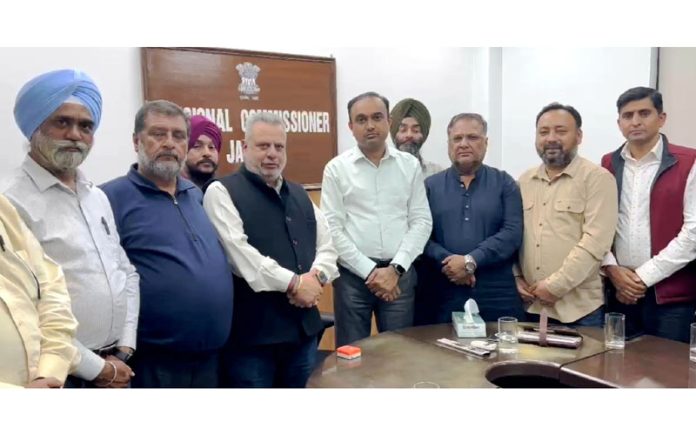 Div Com Ramesh Kumar alongwith Union leaders of Government Employees in Jammu on Friday.