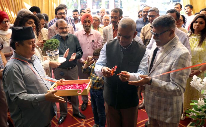 Surinder Jain along with Deepak Kumar, ADGP, Jammu and Kashmir Police inaugurating new showroom in Jammu on Sunday. -Excelsior/Rakesh