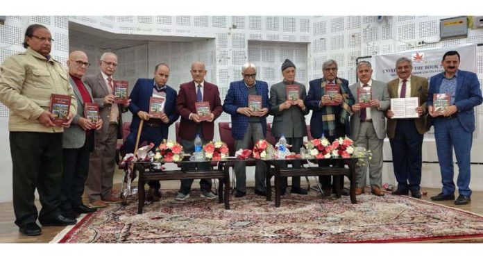 Dignitaries releasing Dr Ashok Raina's history of Kashmir and its Pandits at Writers Club Jammu on Monday.