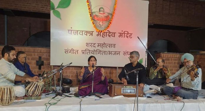An artist performing at the Sharad Mahotsav at Panjvaktra Mahadev Mandir in Jammu on Friday.