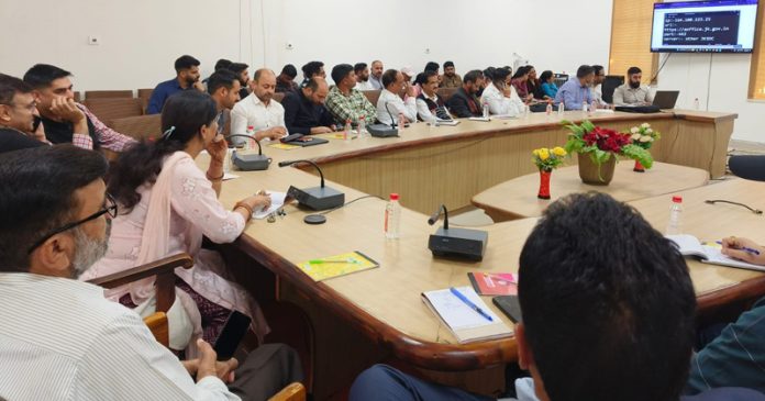 Training staff along with other officers during a workshop organised by the Department of Registration in Jammu on Saturday.