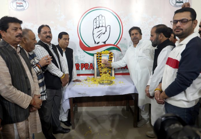 Senior Cong leaders paying floral tribute to Ist PM of India Pt J L Nehru during a function in Jammu. -Excelsior/Rakesh